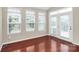 Bright sunroom with hardwood floors and multiple windows, perfect for relaxing or entertaining at 3251 Park South Station Blvd, Charlotte, NC 28210