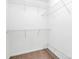 Walk-in closet with white walls, carpet flooring and adjustable wire shelving at 3251 Park South Station Blvd, Charlotte, NC 28210