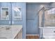 Bright bathroom with a shower stall and mirror at 330 Kilmer Ln, Mooresville, NC 28115