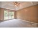 Bedroom with carpet and natural light coming from the window at 330 Kilmer Ln, Mooresville, NC 28115