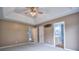 Bedroom featuring fan, neutral walls and trim, and an ensuite bathroom at 330 Kilmer Ln, Mooresville, NC 28115