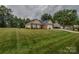 Spacious lawn with a well-maintained brick home and a two-car garage at 330 Kilmer Ln, Mooresville, NC 28115