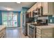 Kitchen with stainless steel appliances, including a gas range and modern microwave at 330 Kilmer Ln, Mooresville, NC 28115