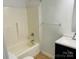 Clean bathroom with a shower-tub combo, and updated vanity with a countertop sink at 3701 Tipperary Pl, Charlotte, NC 28215