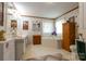 Bright bathroom featuring a soaking tub, double vanity, and decorative accents throughout at 404 St Lukes Church Rd, Kings Mountain, NC 28086