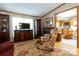 Comfortable living space seamlessly connects to the kitchen, with an inviting seating area perfect for relaxation at 404 St Lukes Church Rd, Kings Mountain, NC 28086