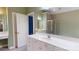 Bathroom featuring double sink vanity, mirror, tile floors, and glass shower at 4066 Belle Meade Cir, Belmont, NC 28012