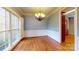 Dining room features hardwood floors, wainscoting, and a large window at 4066 Belle Meade Cir, Belmont, NC 28012