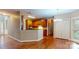 Open concept kitchen with wood floors, granite countertops, and stainless appliances at 4066 Belle Meade Cir, Belmont, NC 28012