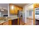 Kitchen features stainless steel appliances, granite countertops, and hardwood floors at 4066 Belle Meade Cir, Belmont, NC 28012