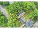 Aerial view of a home showcasing its location, landscaping, and proximity to surrounding neighborhood amenities at 409 W Kingston Ave, Charlotte, NC 28203