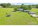 Large grassy yard with trampoline, RV, shed and playset, providing a huge space for recreation and relaxation at 4122 Canal Rd, Marshville, NC 28103