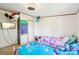 Cozy bedroom with two twin beds, colorful bedding, and whimsical wall decorations for a playful space at 4122 Canal Rd, Marshville, NC 28103