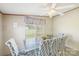 Dining room features a stylish table setting with patterned chairs and ample natural light at 4122 Canal Rd, Marshville, NC 28103