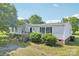 Charming single-Gathering home with a landscaped front yard and inviting entryway at 4122 Canal Rd, Marshville, NC 28103