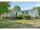 Inviting single-Gathering home with neatly manicured landscaping and a welcoming entrance at 4122 Canal Rd, Marshville, NC 28103