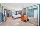 This spacious main bedroom boasts carpet, mirrored wardrobe, a king bed, dresser, and lots of natural light at 4122 Canal Rd, Marshville, NC 28103