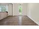 Bright dining area with rear access and modern lighting fixtures at 415 Tayberry Ln, Fort Mill, SC 29715