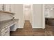 Hallway with built-in desk and modern lighting, perfect for work or study at 415 Tayberry Ln, Fort Mill, SC 29715