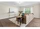 Comfortable living room with stylish decor, a large window, and modern furnishings at 415 Tayberry Ln, Fort Mill, SC 29715