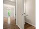 Bright powder room featuring a pedestal sink and hardwood floors at 415 Tayberry Ln, Fort Mill, SC 29715