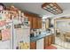 Functional kitchen with essential appliances and ample storage, seamlessly connecting to the dining area at 4155 Slanting Bridge Rd, Sherrills Ford, NC 28673