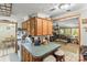 Spacious kitchen featuring a breakfast bar, tile floors, and an open view to the living room at 4155 Slanting Bridge Rd, Sherrills Ford, NC 28673