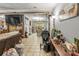 Open-concept living room with tile flooring, seamlessly connecting to the dining area, creating an inviting space at 4155 Slanting Bridge Rd, Sherrills Ford, NC 28673