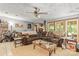 Comfortable living room featuring a large sectional sofa and abundant natural light at 4155 Slanting Bridge Rd, Sherrills Ford, NC 28673