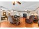Inviting living room with hardwood floors, neutral tones, and comfortable seating arrangement at 4600 Beatties Ford Rd, Charlotte, NC 28216