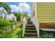 Back deck and staircase lead to a charming outdoor living space at 509 S Clay St, Gastonia, NC 28052
