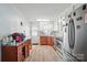 Functional kitchen with stainless steel appliances, updated countertops and ample natural light at 509 S Clay St, Gastonia, NC 28052