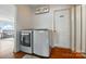 Convenient laundry room with modern washer and dryer; note the Wash and Dry Laundry Co. sign at 509 S Clay St, Gastonia, NC 28052