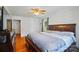 Comfortable main bedroom with hardwood floors, ceiling fan, and closet at 509 S Clay St, Gastonia, NC 28052