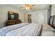 Comfortable main bedroom with hardwood floors and ceiling fan at 509 S Clay St, Gastonia, NC 28052
