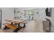 Well-lit living room featuring a large sofa, open concept, and modern decor, perfect for entertaining at 5325 Merwyn Ave, Charlotte, NC 28215