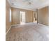 Large bedroom featuring neutral paint, a ceiling fan, and doors leading to a bathroom and another bedroom at 533 Montgrove Nw Pl, Concord, NC 28027
