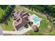 Luxury home showcasing a beautiful backyard oasis with a pool, spa, and outdoor lounge area at 581 Medora Ln, Fort Mill, SC 29708