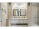 An elegant bathroom with double vanity, lots of storage, and marble countertops at 581 Medora Ln, Fort Mill, SC 29708