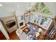 Spacious living room with a fireplace, vaulted ceilings and many windows for natural light at 581 Medora Ln, Fort Mill, SC 29708