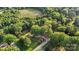 Expansive property with a wooded lot, open green space, and mature trees offering privacy at 603 Sunnybrook Dr, Monroe, NC 28110