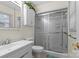 Bright and airy bathroom with a glass-enclosed shower and a modern vanity at 603 Sunnybrook Dr, Monroe, NC 28110