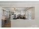 View of an open layout with kitchen, eat-in dining, and access to the living room at 603 Sunnybrook Dr, Monroe, NC 28110
