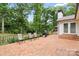 Brick patio with seating area and grill, perfect for outdoor entertaining and relaxation at 603 Sunnybrook Dr, Monroe, NC 28110