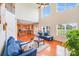 Comfortable living room offering a view of the kitchen area and natural light at 6227 Castlecove Rd, Charlotte, NC 28278