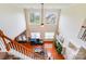 Bright living room boasting high ceilings, a fireplace, and a large window overlooking the backyard at 6227 Castlecove Rd, Charlotte, NC 28278