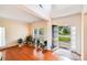 Inviting living room with hardwood floors and many plants for a fresh, natural ambiance at 6227 Castlecove Rd, Charlotte, NC 28278