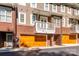 Townhome featuring ground level garages and second story balcony at 6312 Mission Pl, Charlotte, NC 28210