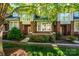 Well-maintained townhome with brick facade, trimmed windows and a beautiful lawn at 6312 Mission Pl, Charlotte, NC 28210