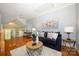 Inviting living room with cozy seating and hardwood floors at 6312 Mission Pl, Charlotte, NC 28210